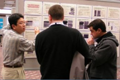 Jun Qu explains his poster