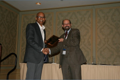 Outgoing Conference Chair Steven Shaffer receives Award from Somuri Prasad