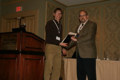 Tevis Jacobs accepts Best Poster Award from Peter Blau