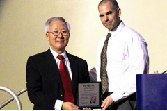 Conference Dinner talk "Remembering Professor Kenneth C. Ludema" presented by Seong Kwan Rhee (left). Honorary plaque presented by Program Chair Thomas Scharf (right).